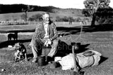120 Man with swag and dogs